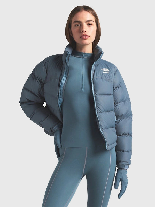 The North Face x Skims 2000 Nuptse Jacket Jacket unisex detail view 2 | Dash Racegear — The North Face × SKIMS 2000 Nuptse Blue Puffer Jacket in bold blue with quilted panels, perfect for women’s everyday winter outfits.