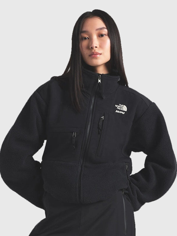 The North Face x Skims 1995 Denali Fleece Jacket Jacket unisex detail view 7 | Dash Racegear — Women’s The North Face x SKIMS 1995 Black Denali Fleece Jacket in deep onyx with zip pockets, ideal for winter layering and outings.