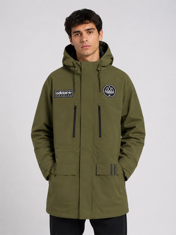 Adidas SPZL Sunnyhurst Anorak Jacket Jacket unisex detail view 5 | Dash Racegear — Adidas SPZL Sunnyhurst outer shell in olive with utility pouch storage and adjustable waist cinch