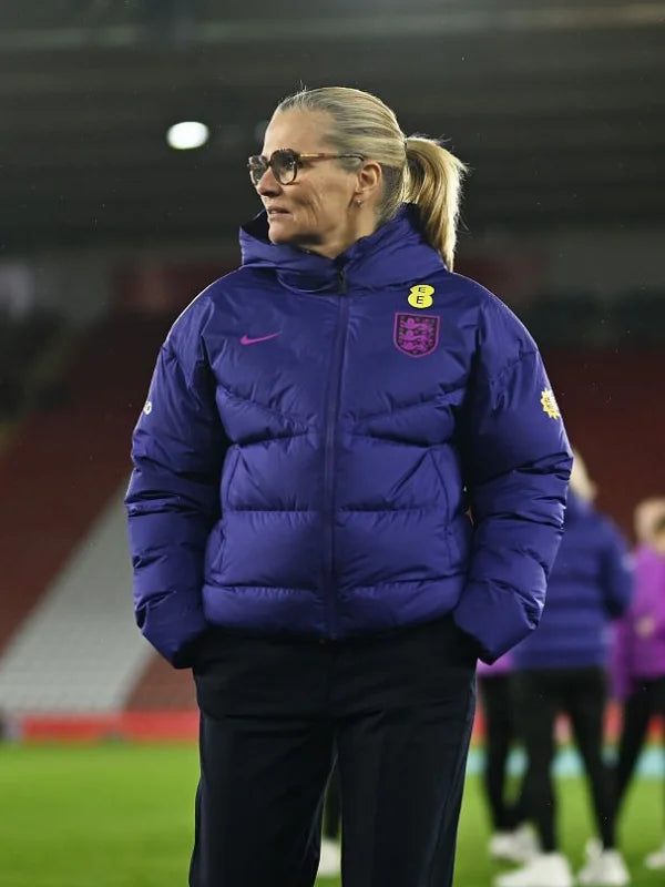 Sarina Wiegman Women’s International Friendly Match Puffer Jacket Puffer Jacket unisex detail view 3 | Dash Racegear — Sarina Wiegman England Lionesses Women’s International Friendly Nike Hood Puffer Jacket featuring lightweight warmth for everyday wear.