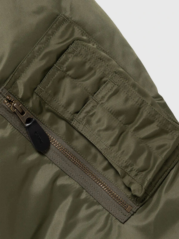 Pokemon x Human Made Satin Bomber Jacket Bomber Jacket unisex detail view 3 | Dash Racegear — Unisex olive green bomber jacket combining anime-inspired aesthetics with premium streetwear fashion energy.