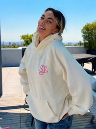 Sincerely Yours Gloss Pocket Hoodie Hoodie unisex front product view | Dash Racegear — Soft cream hoodie designed with a glossy front pocket feature, giving a subtle yet eye-catching modern touch.