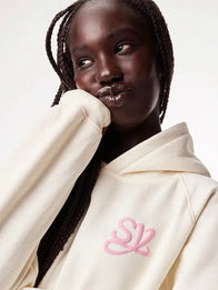 Sincerely Yours Gloss Pocket Hoodie Hoodie unisex detail view 6 | Dash Racegear — Minimal cream hoodie with unique gloss pocket detail, combining comfort and a fresh contemporary streetwear vibe.