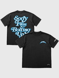 Seen x Chargers Sorry I Was Bolting Up T-Shirt Shirt unisex front product view | Dash Racegear — Seen collaboration black T-shirt inspired by Chargers fan culture and bold messaging