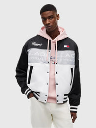 Tommy Hilfiger x Cadillac F1 Team Miami Varsity Jacket Varsity Jacket unisex front product view | Dash Racegear — Tommy Hilfiger x Cadillac 2026 F1 Team Miami Varsity Jacket Black & White bold color-block design with snap closure for unisex race-day wear