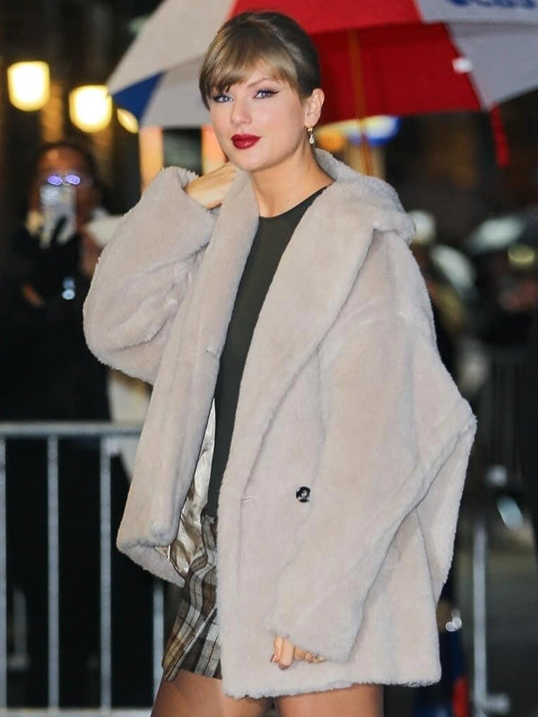 Taylor Swift Late Show With Stephen Colbert Fur Coat Coat unisex front product view | Dash Racegear — Taylor Swift faux fur teddy coat inspired by her Late Show With Stephen Colbert appearance, featuring a soft plush texture.