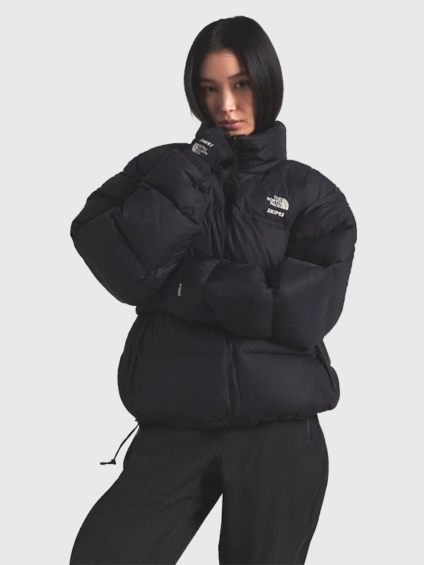 The North Face x Skims 1996 Nuptse Jacket Jacket unisex detail view 9 | Dash Racegear — The North Face × SKIMS Black Puffer 1996 Nuptse Jacket showcasing iconic oversized padding for fashion-forward winter looks.
