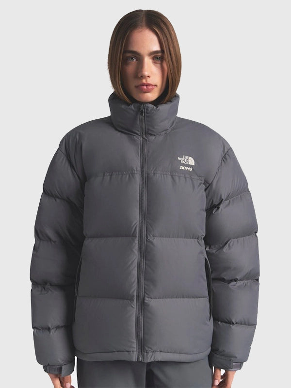 The North Face x Skims 1996 Nuptse Jacket Jacket unisex detail view 6 | Dash Racegear — Grey The North Face × SKIMS Nuptse 1996 Jacket featuring premium puff panels suited for unisex fashion and chilled-weather routines.
