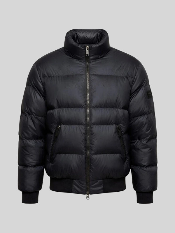 UEFA Champions League Vincent Kompany Puffer Jacket Puffer Jacket unisex detail view 3 | Dash Racegear — 2026 UEFA Champions League black puffer jacket worn at Signal Iduna Park, sporty sideline football fashion.