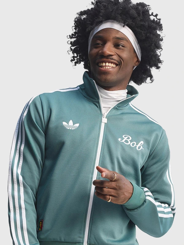 Adidas x Bob Marley Track Jacket Jacket unisex front product view | Dash Racegear — Adidas x Bob Marley “Football is Freedom” Track Jacket for men and women, Green with bold graphic and relaxed fit.