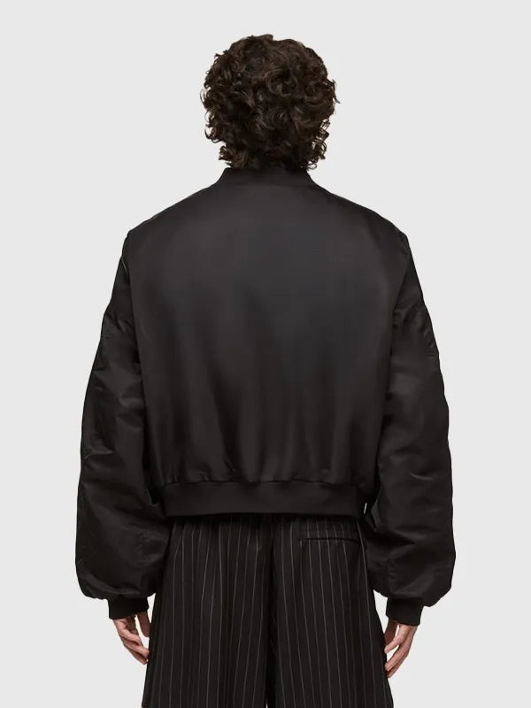 Adidas x Willy Chavarria Coaches Jacket Jacket unisex detail view 4 | Dash Racegear — Black satin coaches jacket from Adidas x Willy Chavarria 2026 with subtle graphic details and ribbed cuffs.