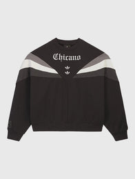 Adidas x Willy Chavarria Chicano Crewneck 2.0 Sweatshirt Sweatshirt unisex front product view | Dash Racegear — Adidas x Willy Chavarria black Chicano 2.0 sweatshirt with ribbed hem and cuffs, oversized fit, and striking front logo.