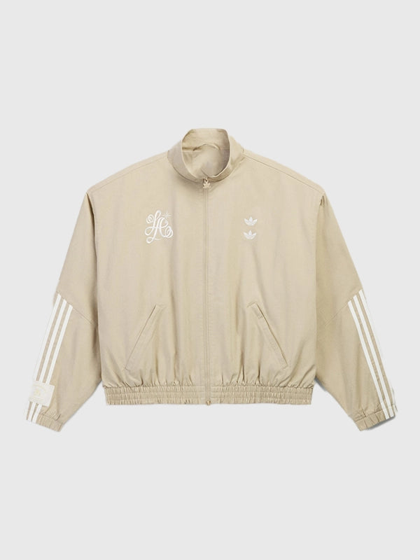 Adidas x Willy Chavarria Compton Cowboys Chino Track Jacket Jacket unisex front product view | Dash Racegear — Unisex Adidas x Willy Chavarria x Compton Cowboys track jacket in chino beige with embroidered trefoil and rose details for bold street style.