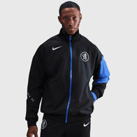 Chelsea Nike Third Anthem Jacket Jacket unisex front product view | Dash Racegear — Chelsea FC Nike Third Kit black and blue training anthem jacket showcasing club crest.