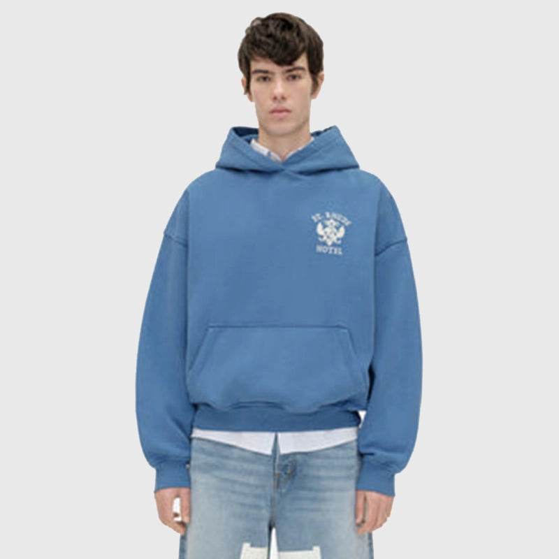 St. Rhude Seal Pullover Hoodie Hoodie unisex front product view | Dash Racegear — Lifestyle image of St. Rhude Hotel Seal royal blue hoodie.