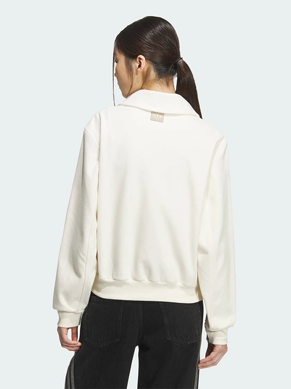 Adidas 2026 LNY Halfzip Sweatshirt Sweatshirt unisex detail view 2 | Dash Racegear — Recreation cream Adidas Lunar New Year fleece sweatshirt with halfzip closure and soft texture