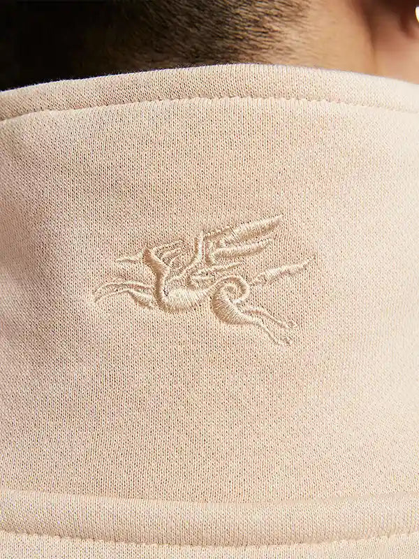 Nike Sportswear Year of the Horse Half-Zip Sweatshirt Sweatshirt unisex detail view 3 | Dash Racegear — Nike quarter-zip sweatshirt in light beige featuring a relaxed fit and subtle seasonal design elements