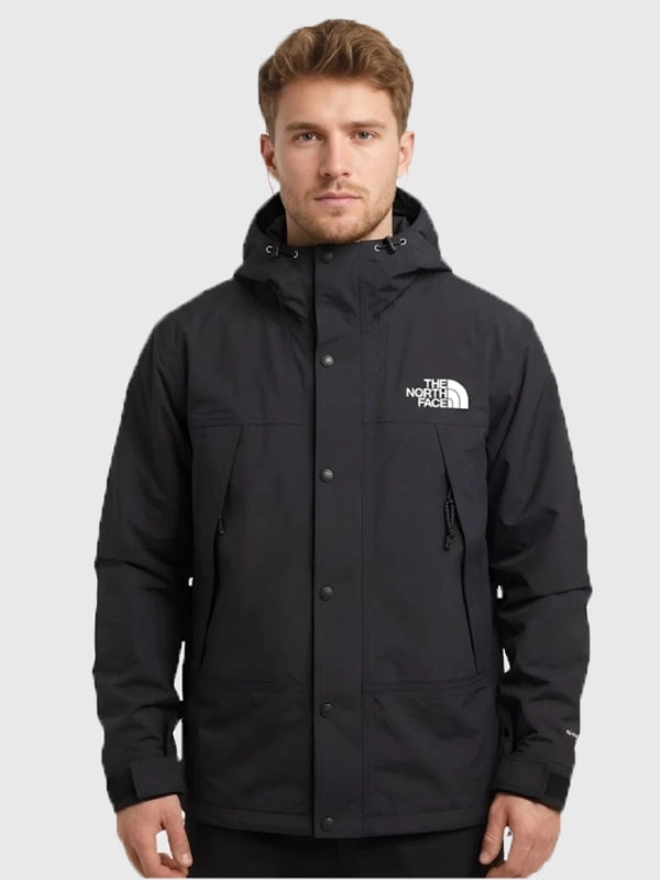The North Face x Sky High Farm Rain Jacket Jacket unisex detail view 3 | Dash Racegear — Unisex The North Face x Sky High Farm black relaxed rain jacket, graphic streetwear for wet weather style.