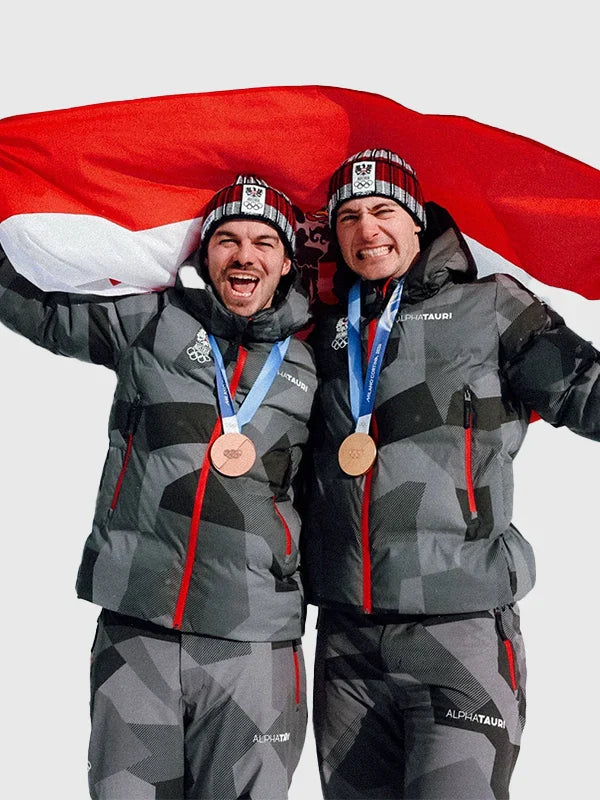 Winter Olympics 2026 Team Austria Grey Jacket Jacket unisex front product view | Dash Racegear — Grey Milano Cortina 2026 ski jumping Team Austria hooded jacket with bold event graphics for Winter Olympics fans.