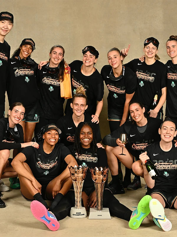 NY Liberty 2026 Commissioners Cup Champions Shirt Shirt unisex front product view | Dash Racegear — WNBA 2026 Commissioners Cup Champions Locker Room Shirt blends casual comfort with a sleek New York Liberty aesthetic.