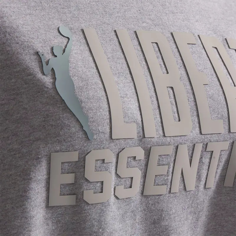 New York Liberty Fear of God WNBA x ESSENTIALS T-Shirt Shirt unisex detail view 3 | Dash Racegear — New York Liberty T-Shirt – Fear of God Essentials