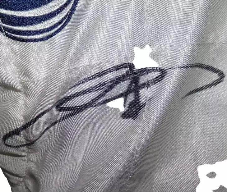 Williams 2009 driver promotional race suit signed by Rosberg and Nakajima