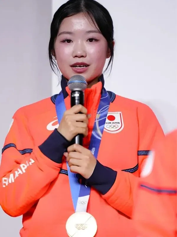 Ami Nakai Winter Olympics 2026 Team Japan Jacket Jacket unisex detail view 2 | Dash Racegear — Bright orange Team Japan jacket worn by figure skater Ami Nakai at Milano Cortina 2026, cozy and eye‑catching fan gear.