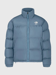 The North Face x Skims 1996 Nuptse Jacket Jacket unisex detail view 3 | Dash Racegear — The North Face × SKIMS 1996 Nuptse Blue Puffer Jacket with voluminous insulation for trendy unisex winter streetwear.