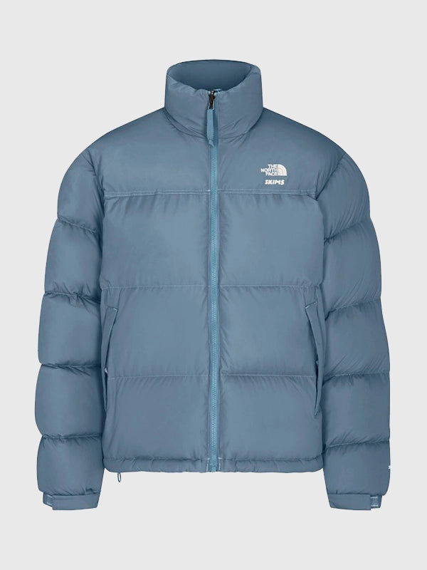 The North Face x Skims 1996 Nuptse Jacket Jacket unisex detail view 3 | Dash Racegear — The North Face × SKIMS 1996 Nuptse Blue Puffer Jacket with voluminous insulation for trendy unisex winter streetwear.