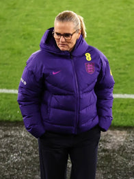 Sarina Wiegman Women’s International Friendly Match Puffer Jacket Puffer Jacket unisex detail view 2 | Dash Racegear — Sarina Wiegman England Lionesses Women’s Nike Hood Puffer Jacket in purple with hood, ideal for fans and outdoor layering.