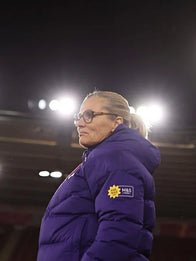 Sarina Wiegman Women’s International Friendly Match Puffer Jacket Puffer Jacket unisex detail view 4 | Dash Racegear — Sarina Wiegman England Lionesses Women’s Purple Nike Hooded Puffer Jacket with team crest, perfect for casual supporter style.