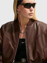 Nike Womens Therma Fit Bomber Jacket Bomber Jacket unisex detail view 2 | Dash Racegear — Brown leather bomber jacket featuring Nike Therma-Fit technology and a timeless women's casual style.