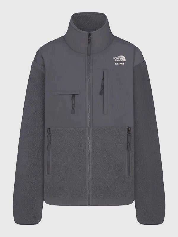 The North Face x Skims 1995 Denali Fleece Jacket Jacket unisex front product view | Dash Racegear — Women’s The North Face x SKIMS 1995 Grey Denali Fleece Jacket with soft plush fleece and overlays, perfect for chilly outdoor walks.