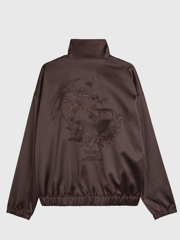 Adidas x Wales Bonner x Y-3 Satin Jacket Jacket unisex detail view 2 | Dash Racegear — A stylish satin track jacket in rich brown tones blending athletic heritage and avant-garde fashion direction from the 2026 collaboration.