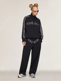 Adidas x Sp5der Rhinestone Tracksuit Tracksuit unisex front product view | Dash Racegear — A sleek black tracksuit featuring Adidas x Sp5der styling, rhinestone accents, and a comfortable everyday fit.