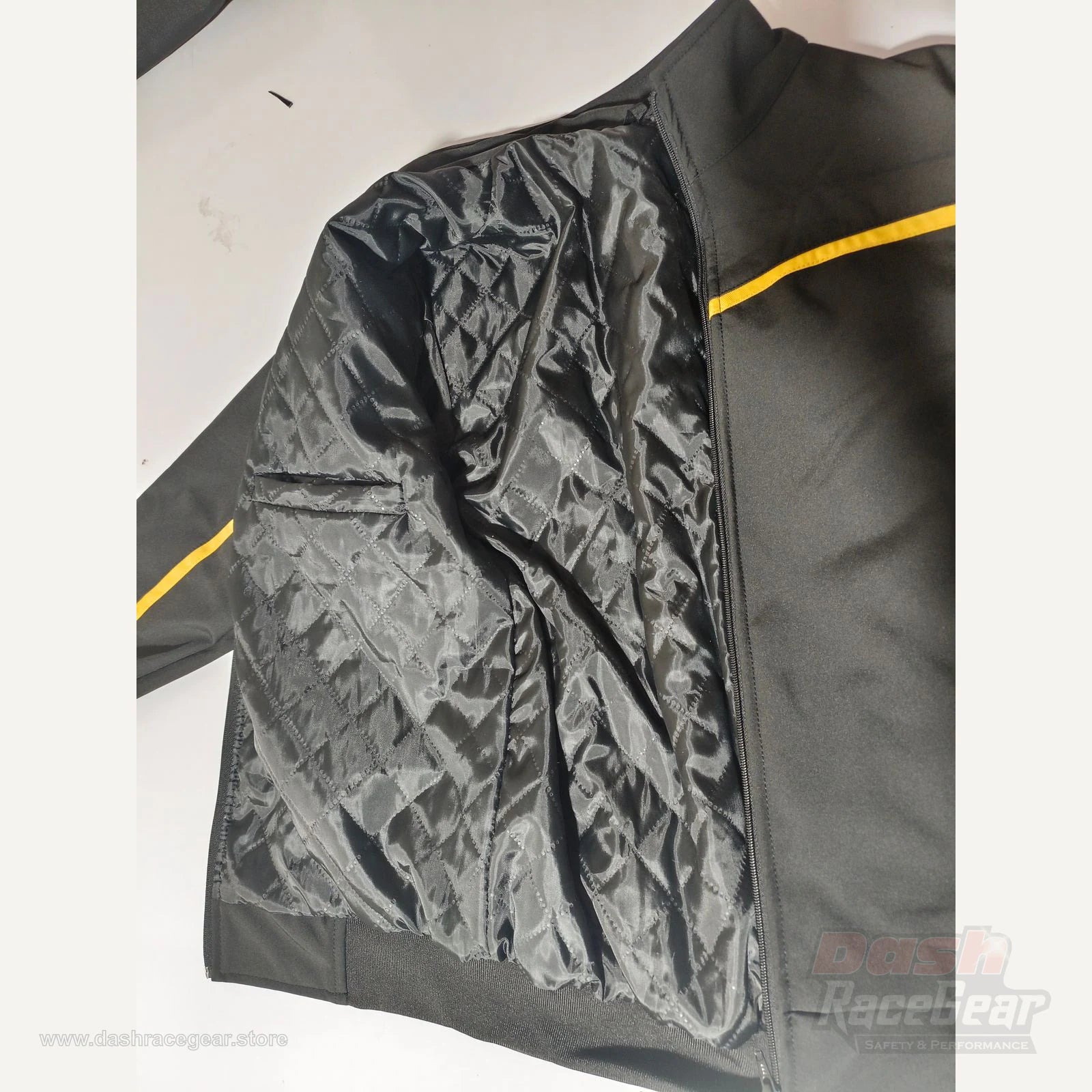 Apex softshell jacket close-up of diamond quilted black inner lining