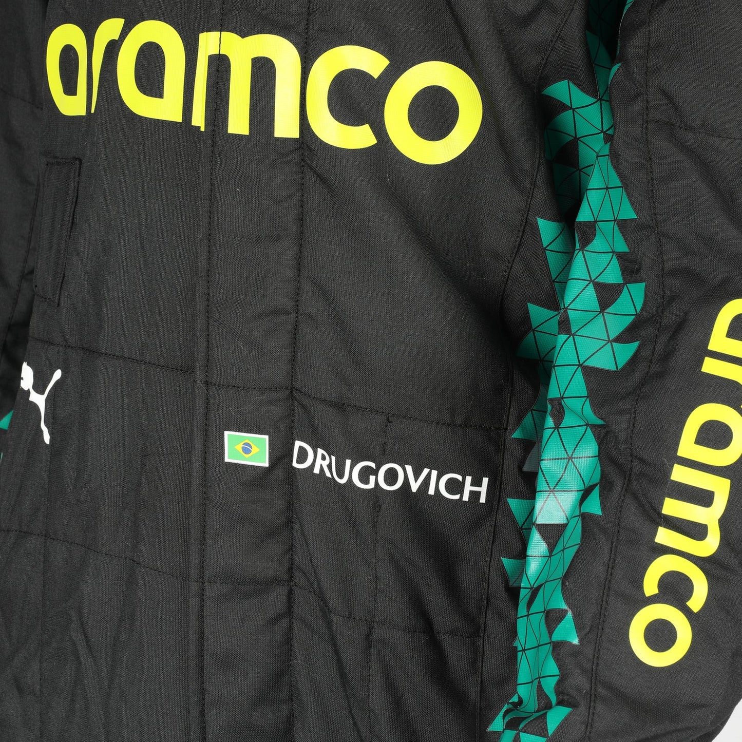  FIA and Puma collar label on Felipe Drugovich’s 2025 Aston Martin F1 race suit – Dash Racegear.