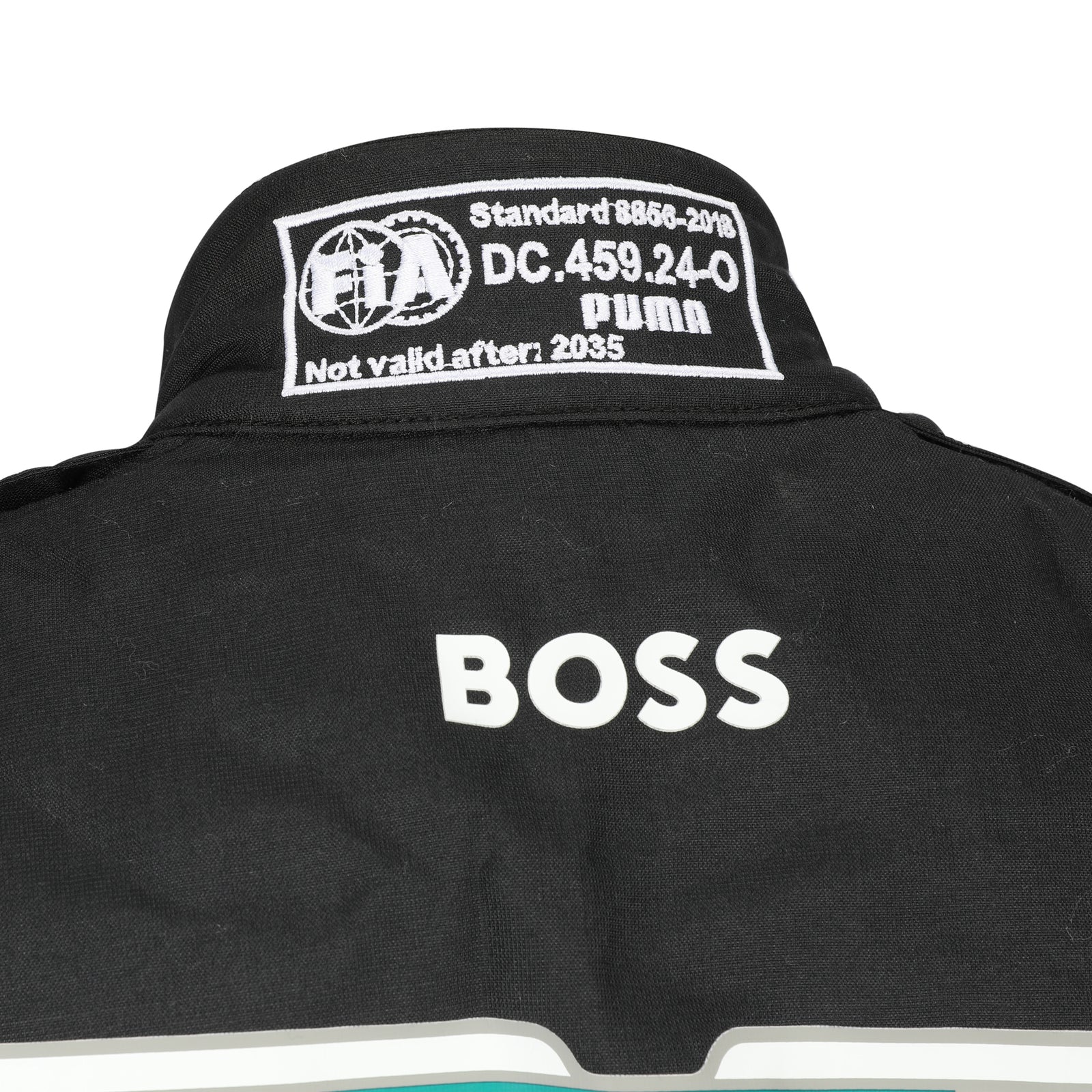 Front view of Felipe Drugovich’s black 2025 Aston Martin Aramco F1 race suit – Dash Racegear.