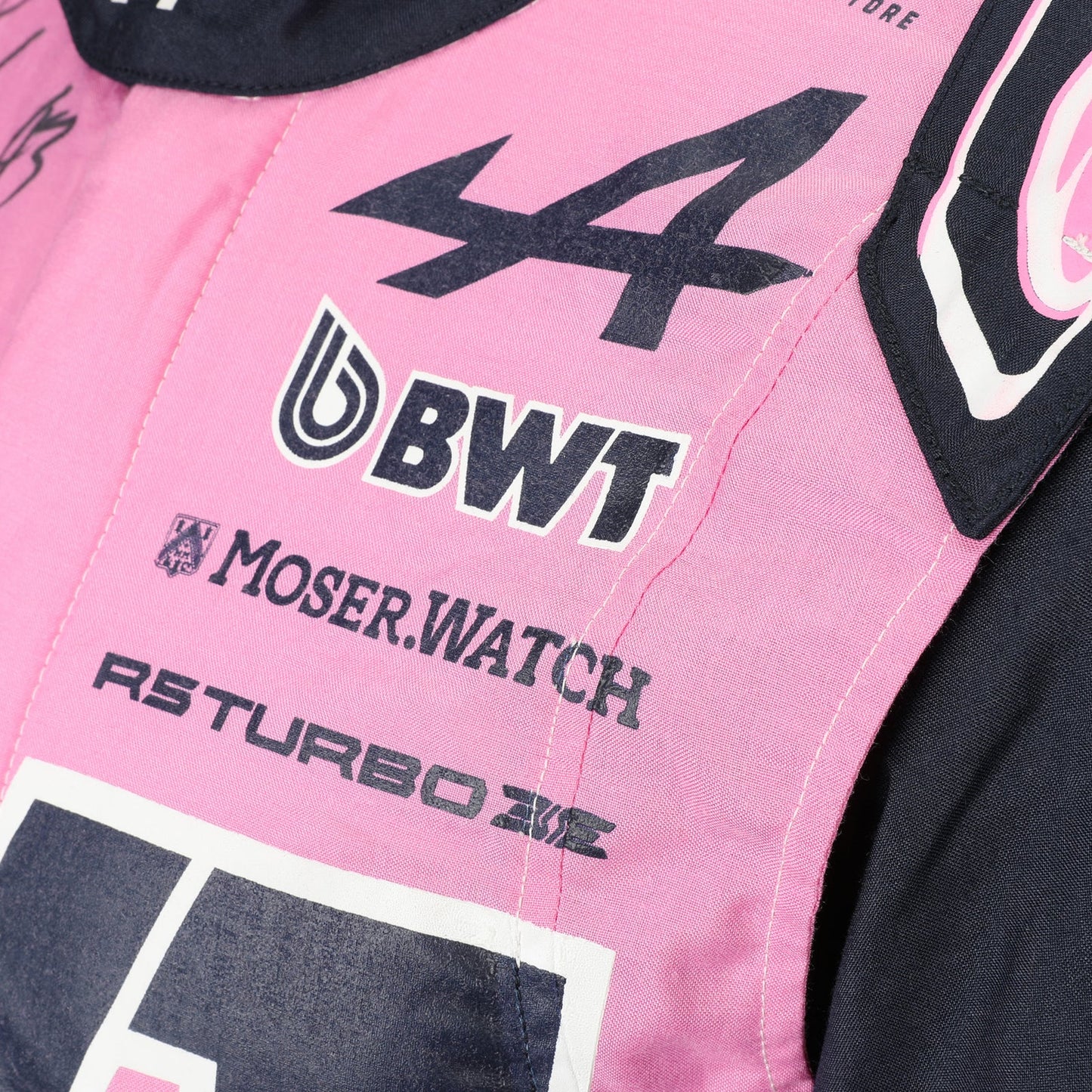 Alpine, BWT and Moser Watch chest logos on Franco Colapinto’s 2026 F1 race suit – Dash Racegear.