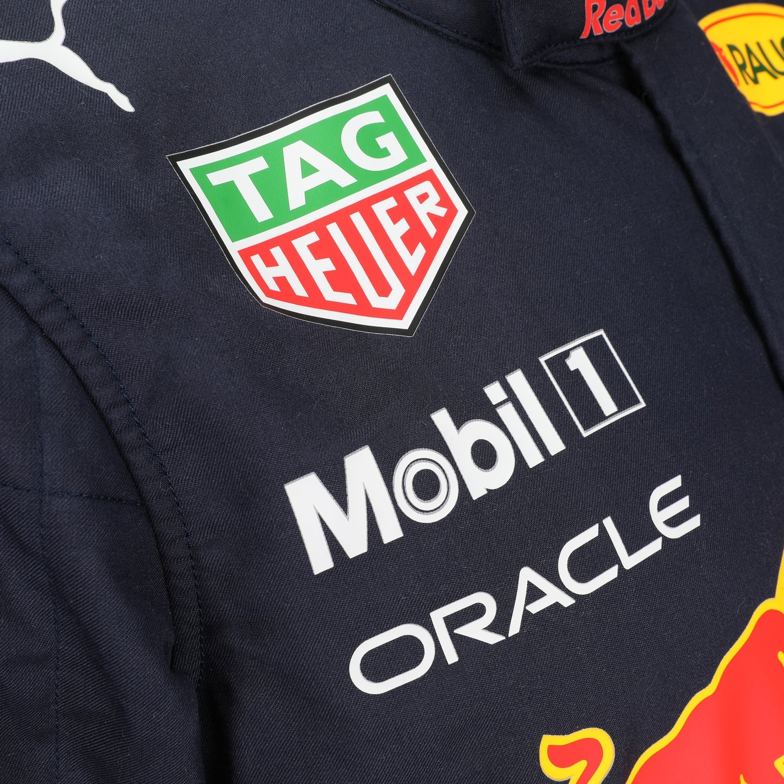 Max Verstappen 2021 Mexican Grand Prix Red Bull Racing F1 Inspired Race Suit in Navy Blue, Side view 2 showing printed sponsor logos, by DASH RACEGEAR