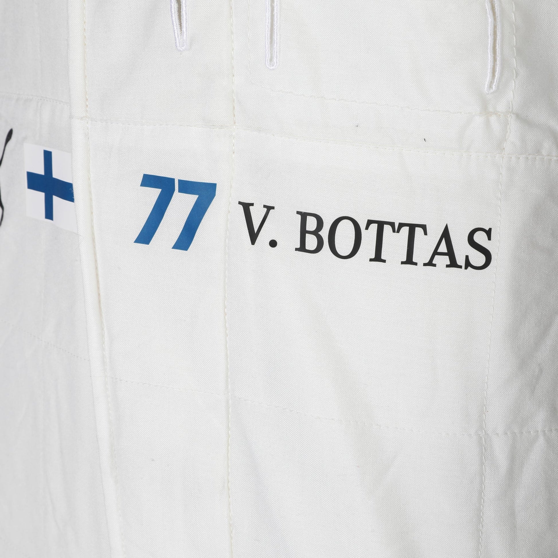 FIA and Tommy Hilfiger labels on Valtteri Bottas 2018 Mercedes F1-inspired race suit